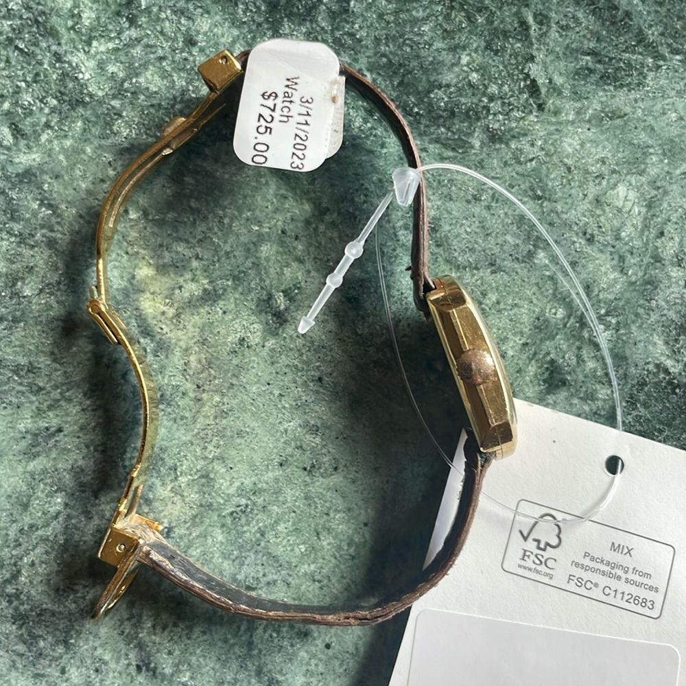 Baum & Mercier vintage time piece/watch - gold and leather strap